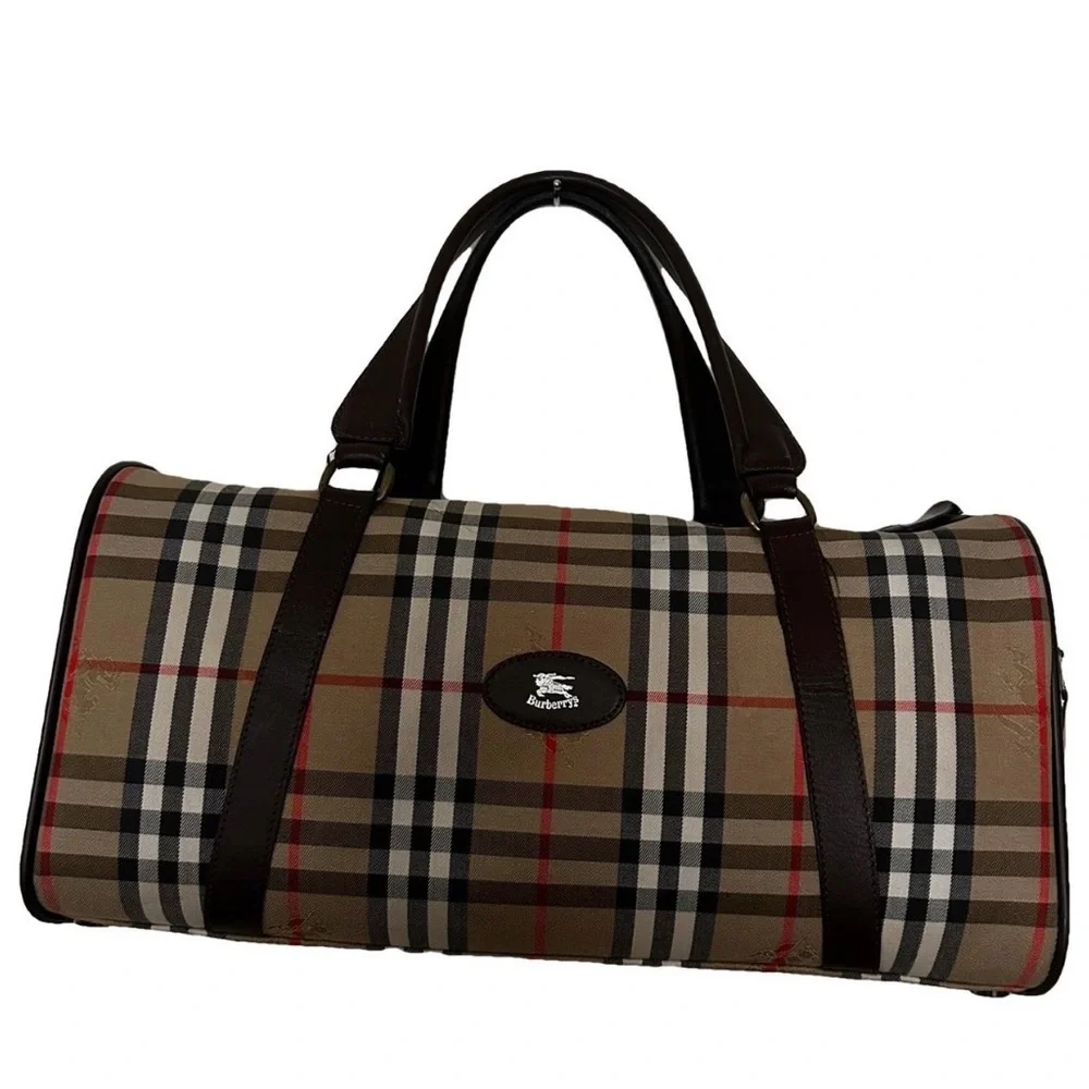 Burberrys Haymarket Boston Tan Duffel with Brown Leather Trim 10H x 19W inches